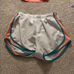 Women's White and Orange Nike Athletic Shorts